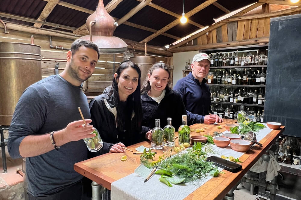 Stacey Witz and her family during a Pisco making class at a distillery in Peru.