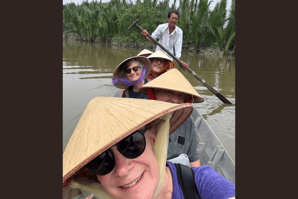 Paula Kramer and Jeff Weiss with friends on the Mekong Delta.