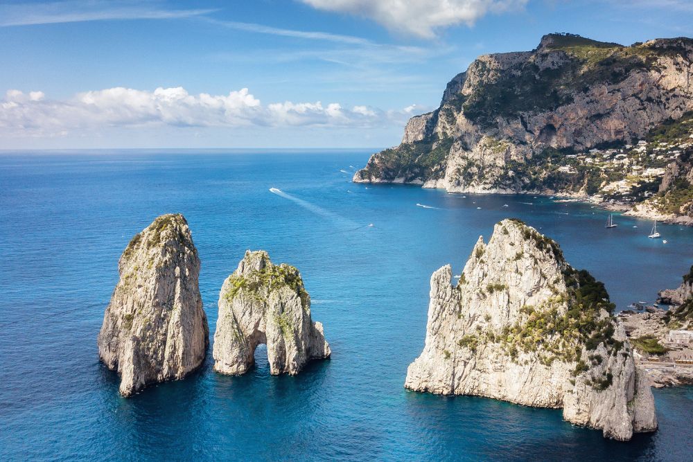 Faraglioni sea stacks in the Mediterranean Sea.