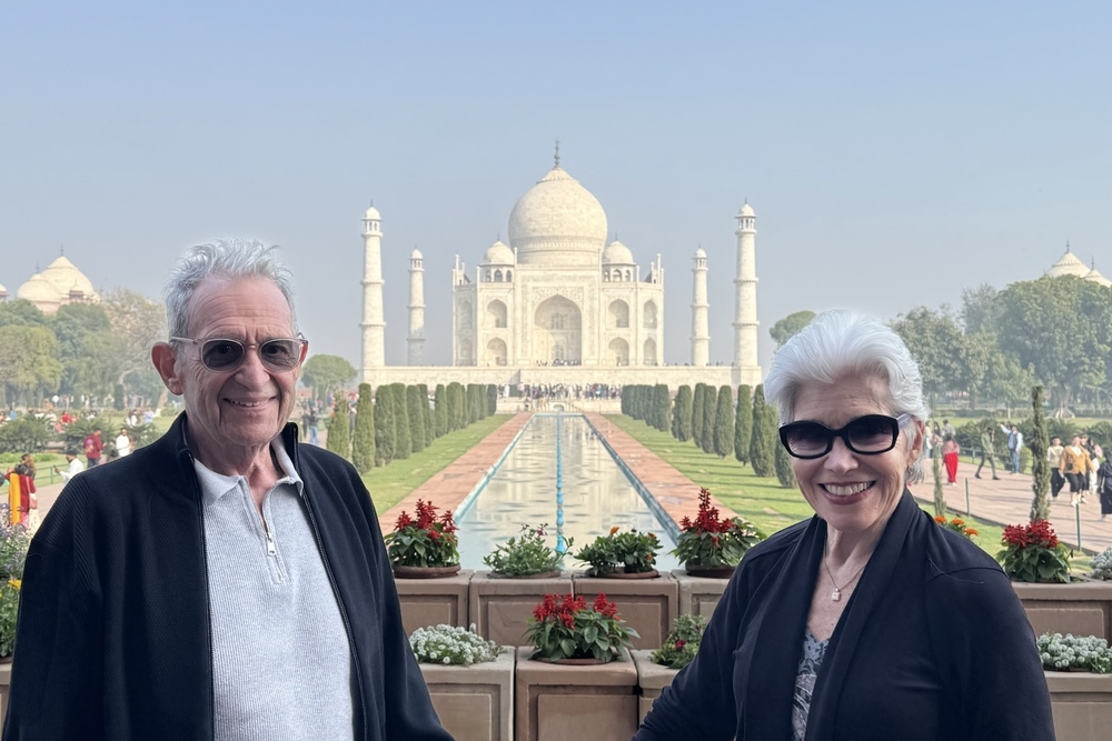 Leonard Sharzer and his wife at the Taj Mahal in India.