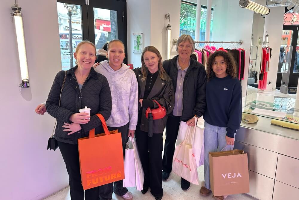 Diane Thormodsgard, her daughter, and twin granddaughters during the Teen Shopping Experience in Paris, France.