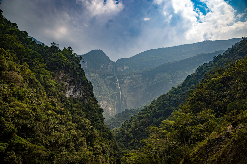Gocta Waterfall surrounded by greenery hills, Peru.