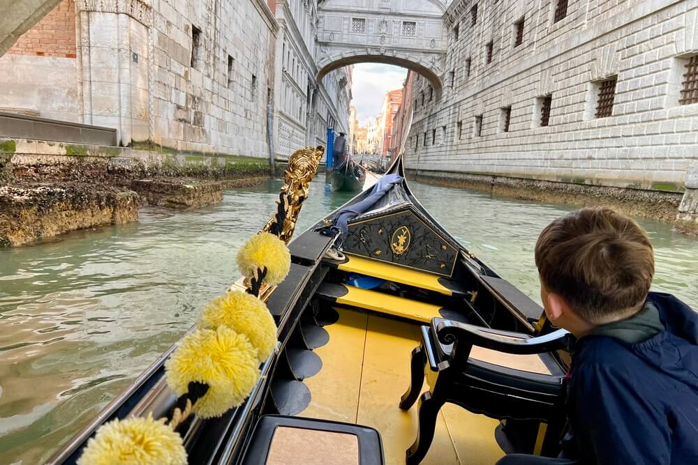 Kathryn Blaze’s son coming up to the Bridge of Sighs on a gondola in Venice, Italy.