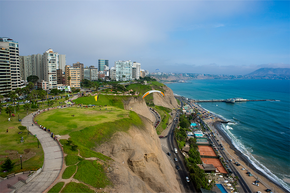 The view of Lima with its cliffs, buildings, and beach, Peru.
