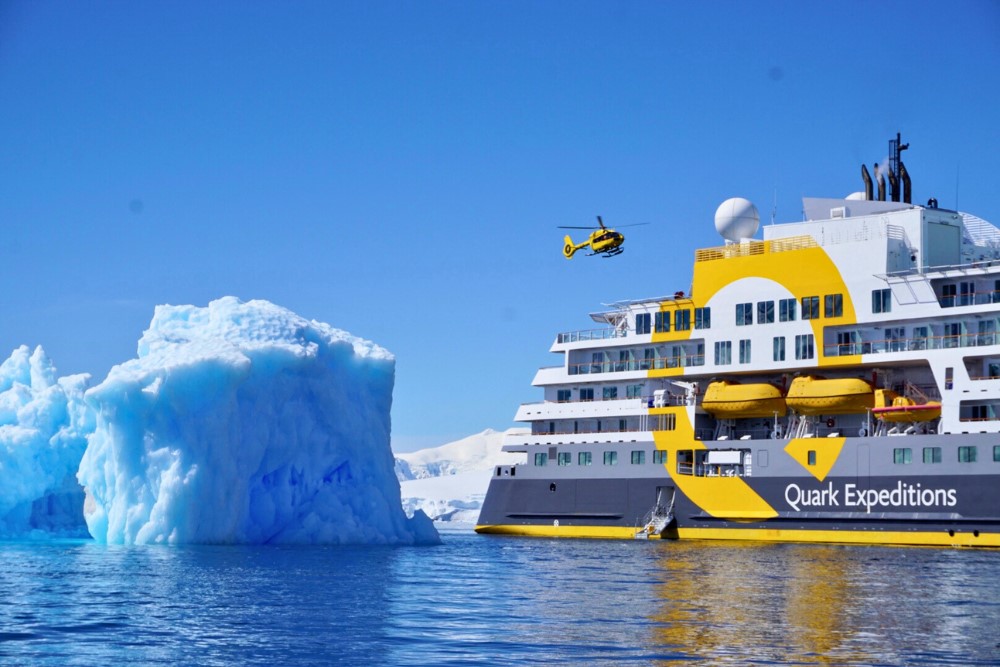 Quark Expeditions ship in Antarctica.