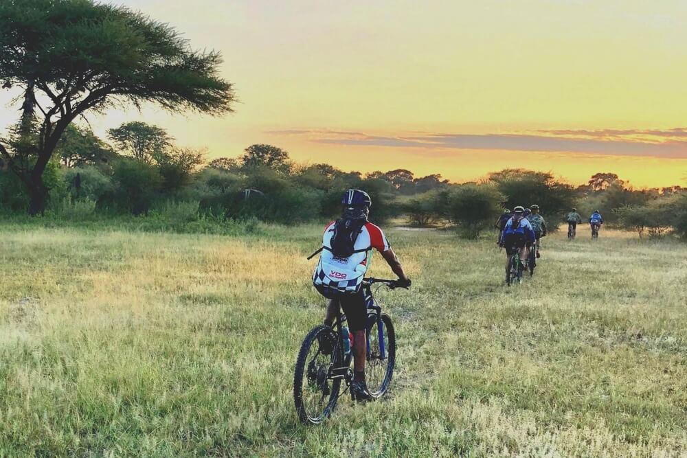 People biking in Botswana.