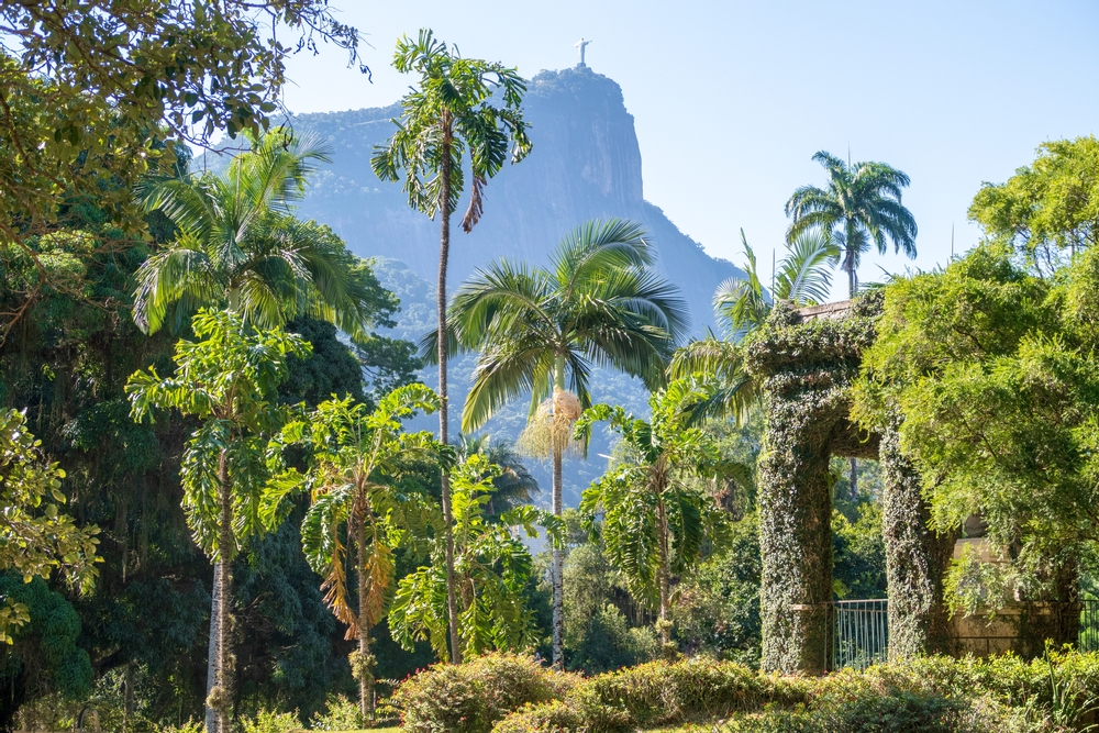 The Botanical Garden and the statue of Christ the Redeemer in the background in Rio de Janeiro, Brazil.
