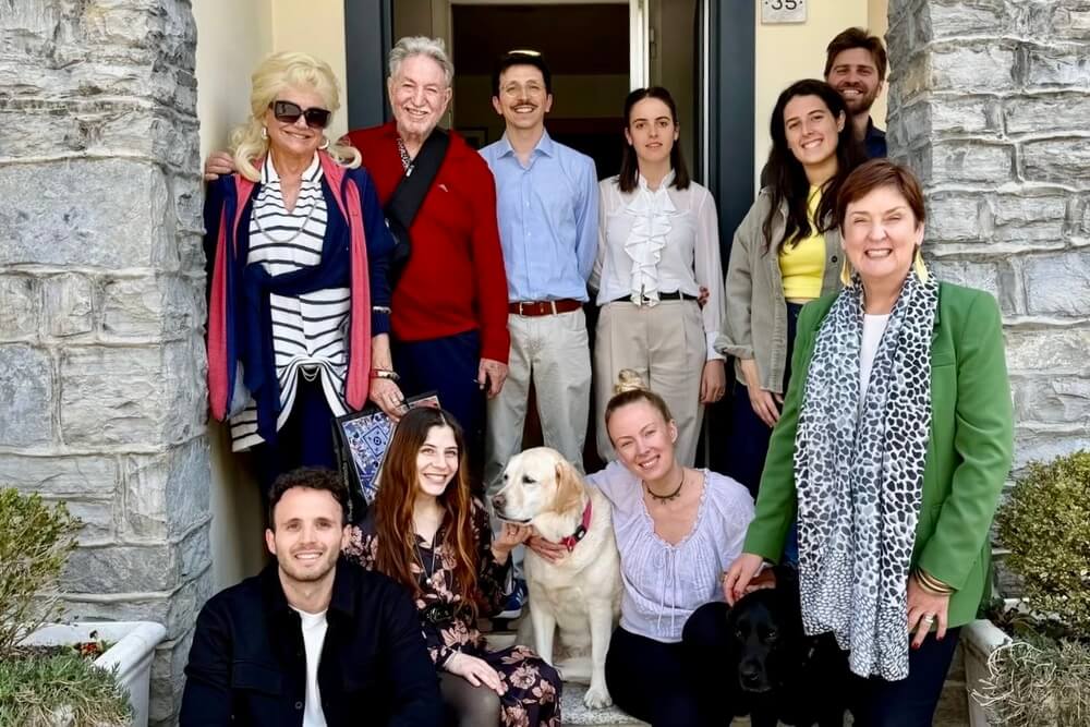Cheryl Cruey and her husband Gary Luckman meeting Andrea Grisdale and their planning team at their office in Italy.