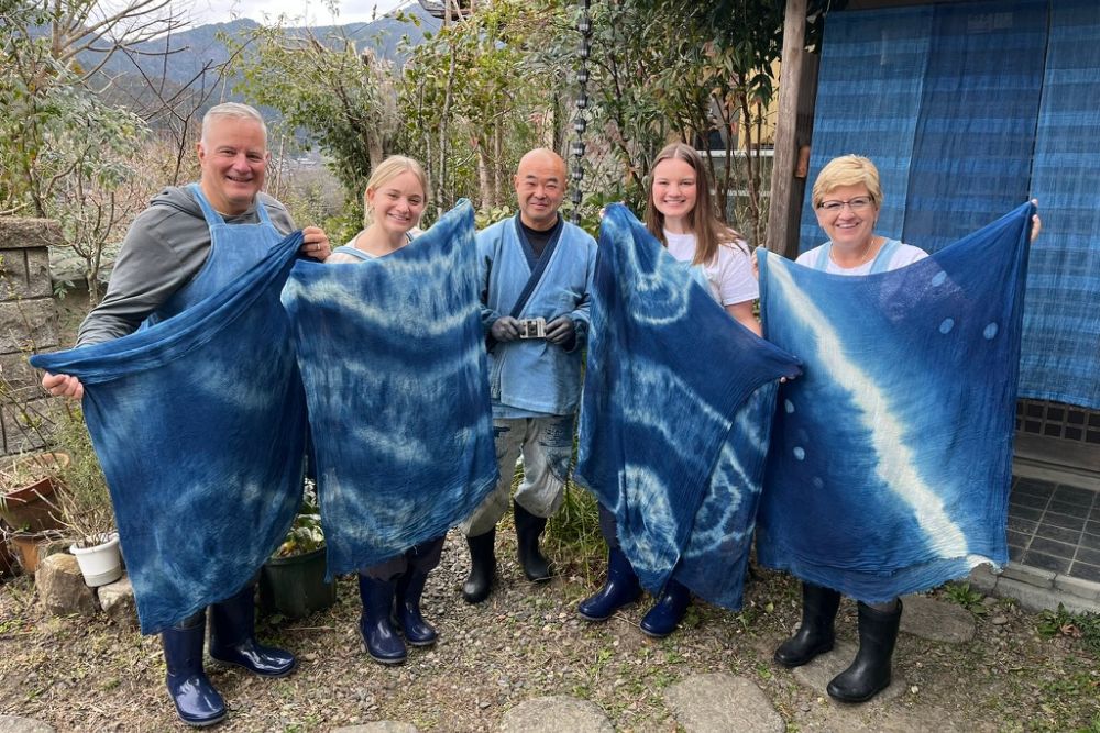 Travelers dye indigo in Japan.