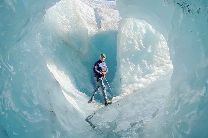 John Savarese exploring ice caves and the Tasman Glacier in New Zealand.