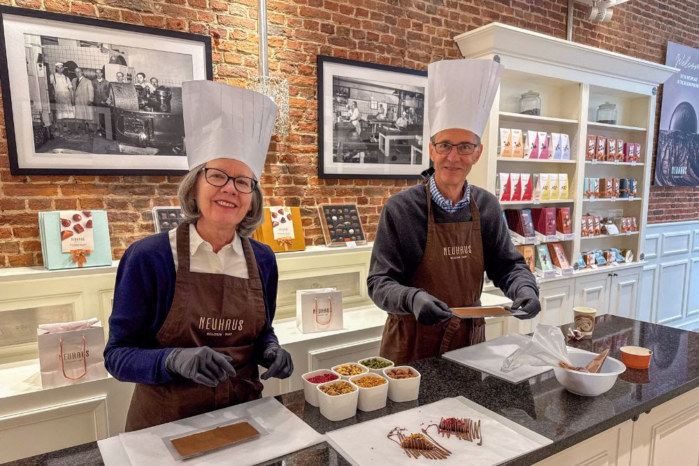 Michael Modak and his wife at a chocolate-making class at Neuhaus in Brussels.