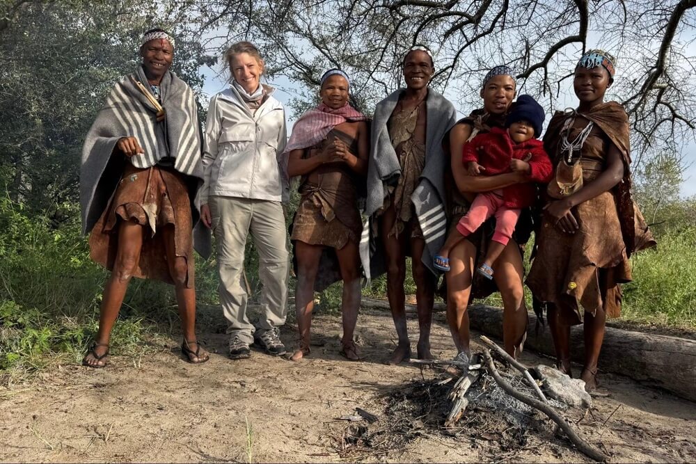 Nichole Bernier and local Bushmen in Botswana.