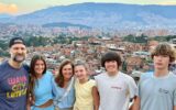 Veronique Padalecki and family with view of Medellin, Colombia in the background.