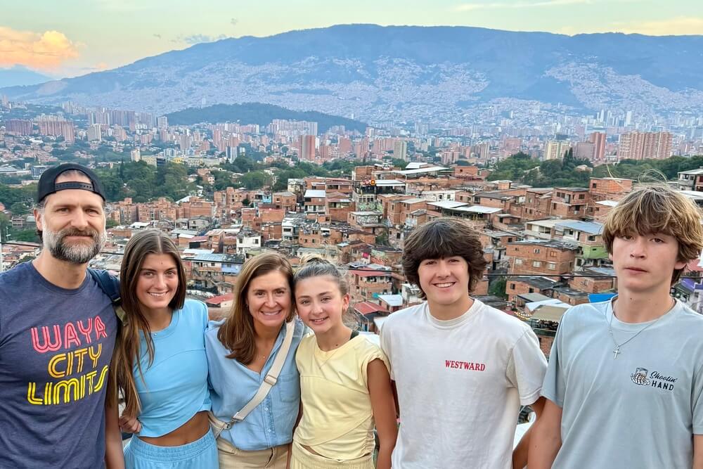 Veronique Padalecki and family with view of Medellin, Colombia in the background.