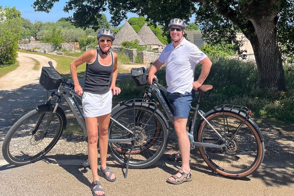 Anne and John McCroskey biking in Puglia, Italy.