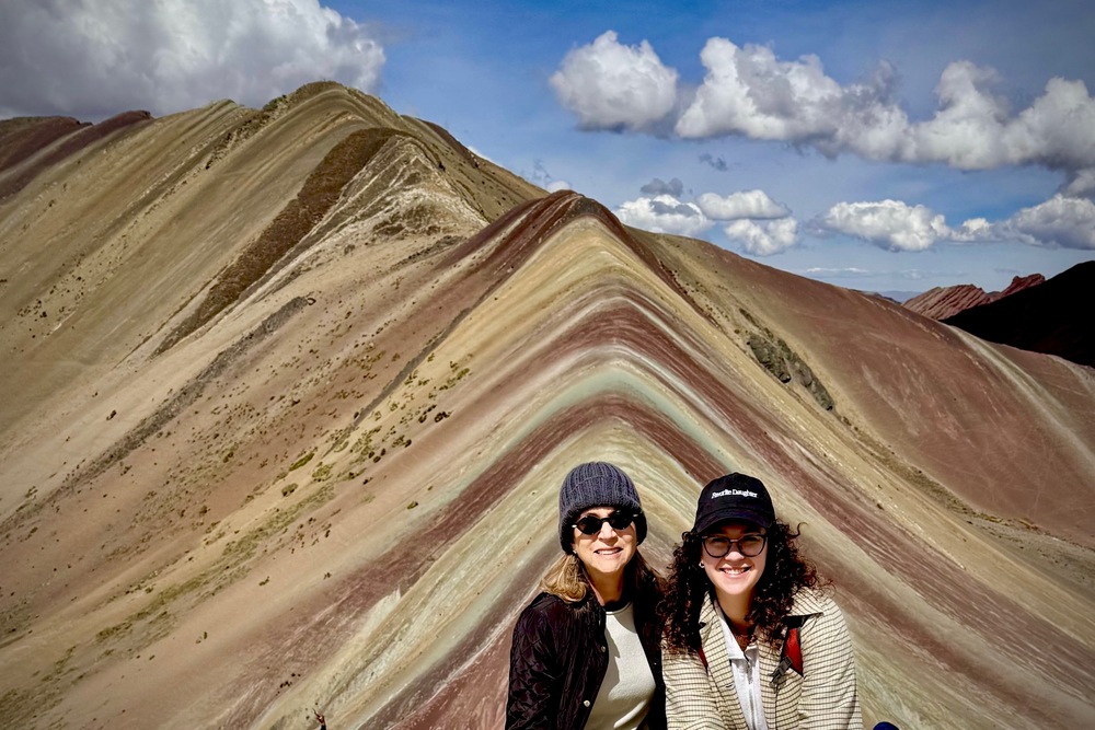 Anne Dhanda and her daughter Isabella Remor on Mount Vinicunca in Peru.