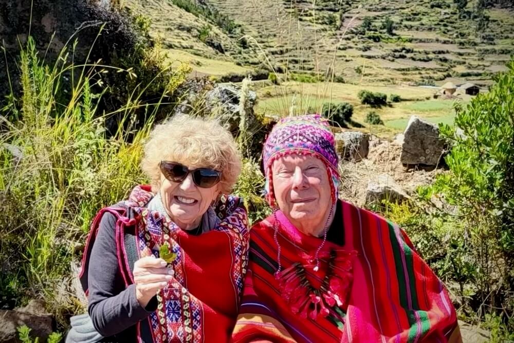 Bunny and Bob Lenhard wearing traditional clothes in Peru.