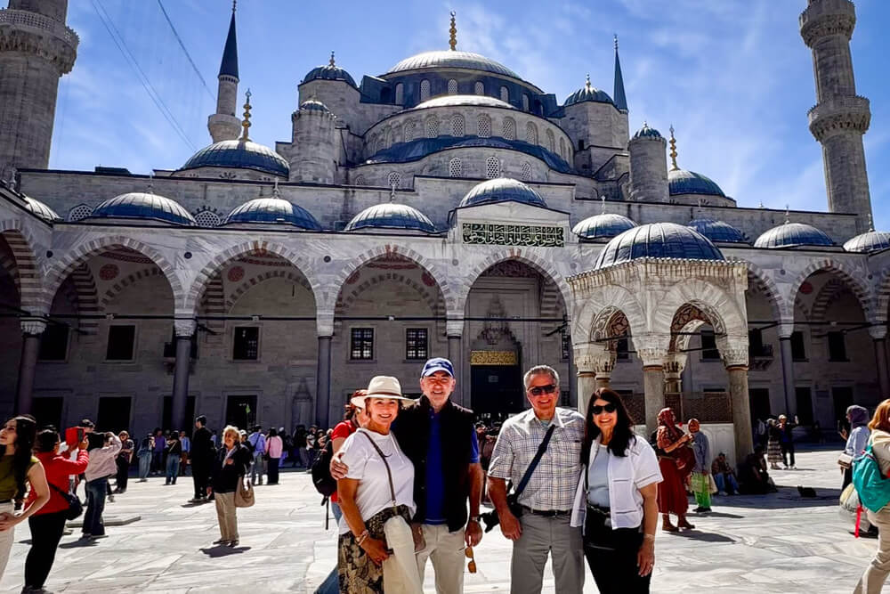 Gail Yester, her husband, and their friends at the Blue Mosque in Istanbul, Turkey.