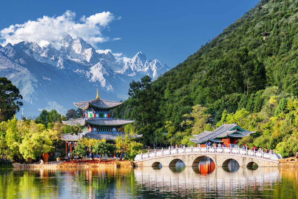 View of Jade Dragon Snow Mountain and the Black Dragon Pool, Lijiang, Yunnan province, China.