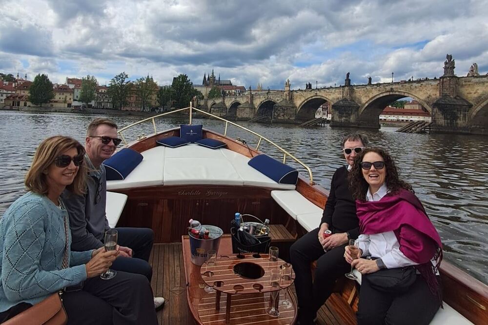 Traveler Jilda Vargas-Adams and her husband with their friends on the Vltava River cruise.