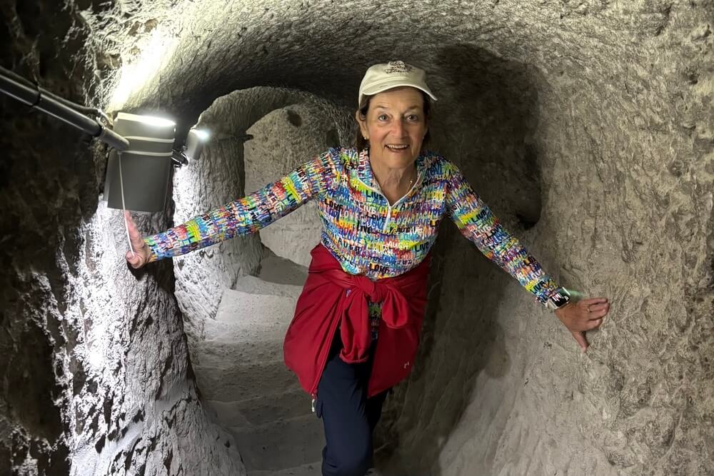 Peggy Schuemann inside Vardzia’s cave complex in Georgia.